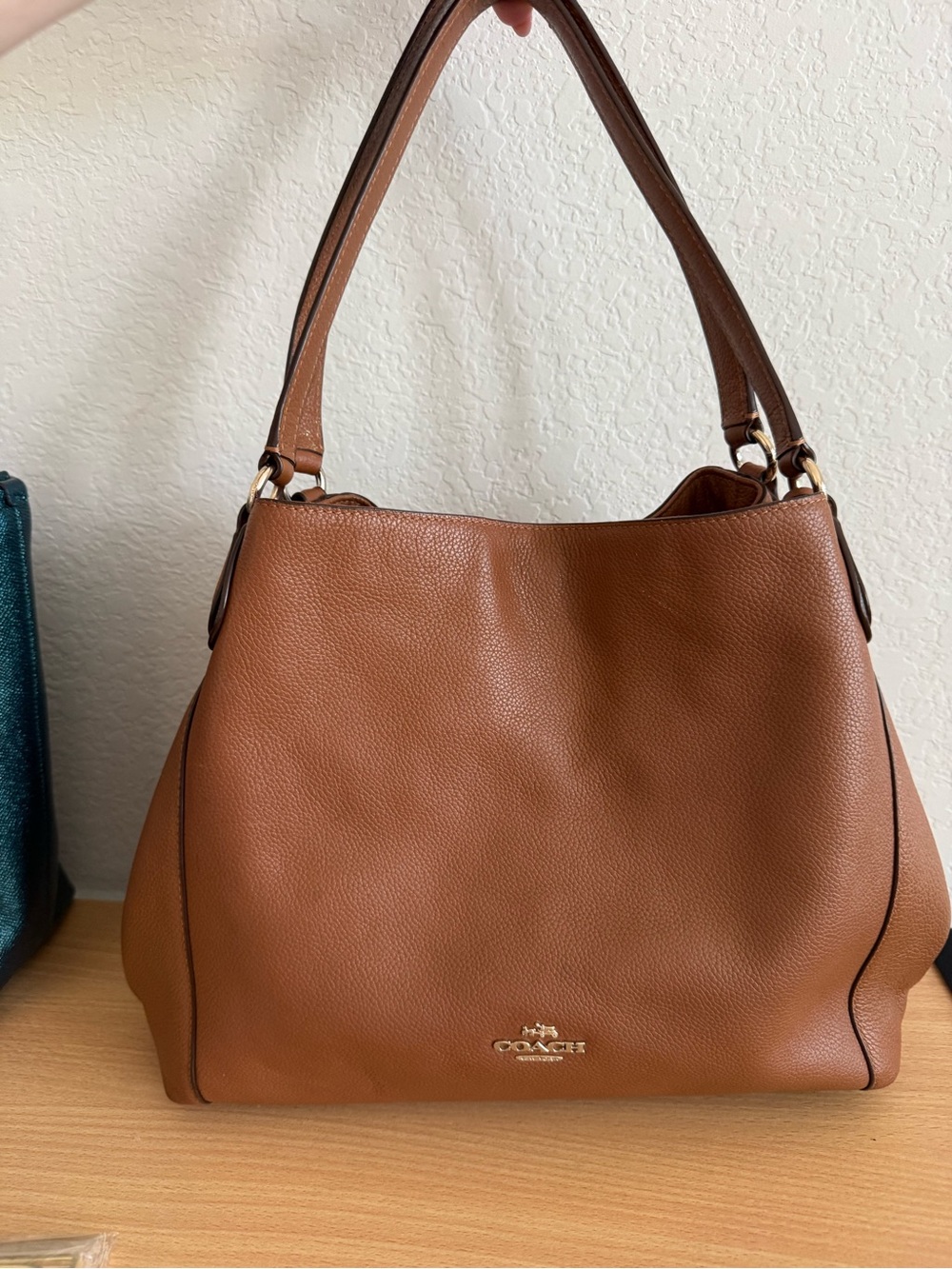 Coach Edie 31 Pebble Leather Shoulder Bag in Brown